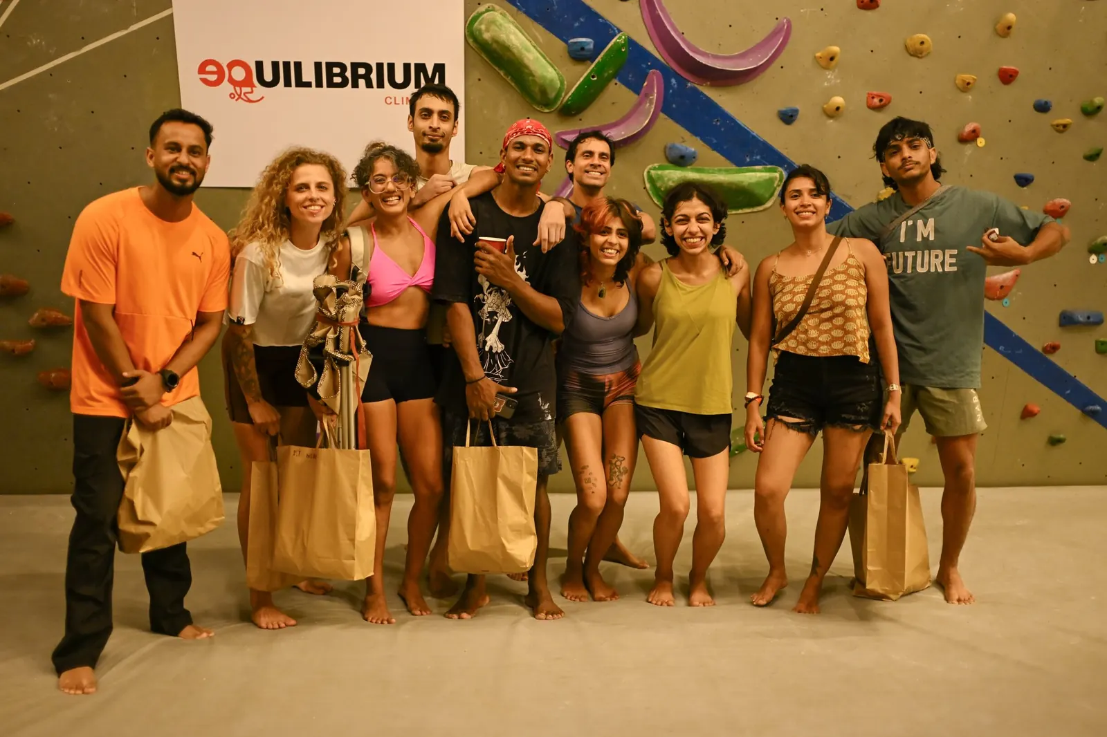 A group of friends celebrating at Equilibrium Climbing, Anjuna